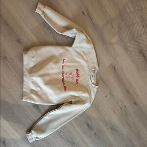 Cream Sweatshirt with Red Graphic